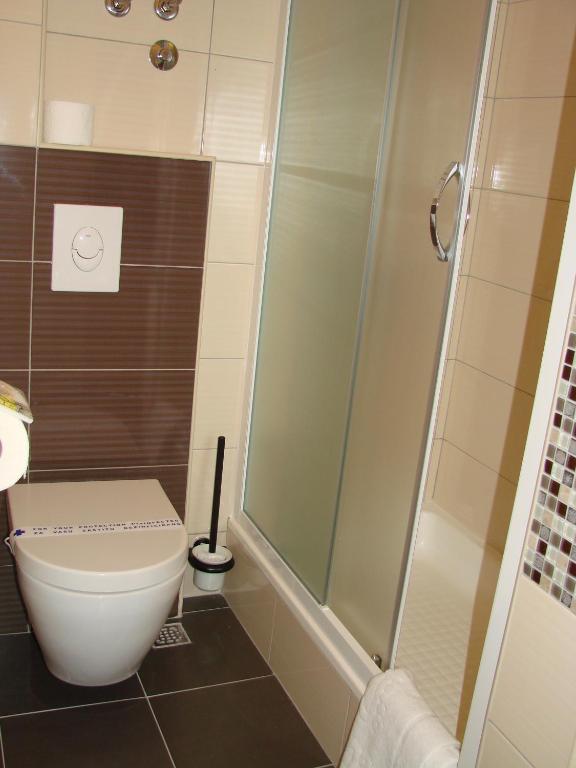 Kúpeľňa v ubytovaní Palace Inn Rooms