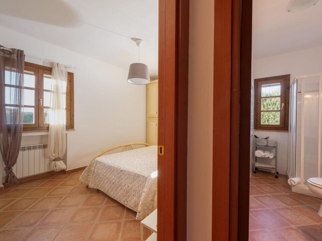 Łóżko lub łóżka w pokoju w obiekcie Apartment Benedetta by Interhome