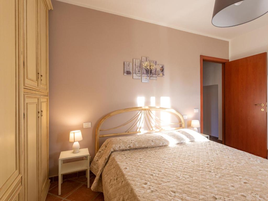 Łóżko lub łóżka w pokoju w obiekcie Apartment Benedetta by Interhome