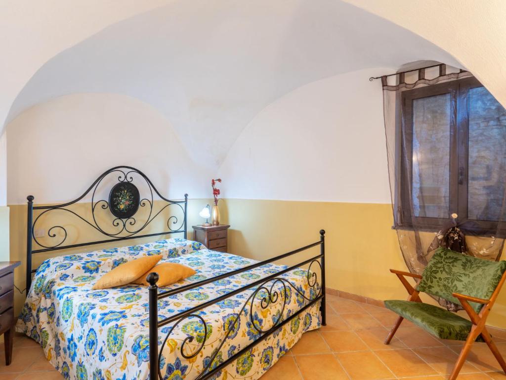 A bed or beds in a room at Apartment Giallo by Interhome