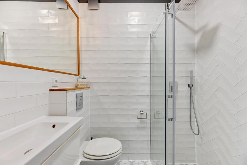 Kúpeľňa v ubytovaní Szeroka Boutique by Downtown Apartments