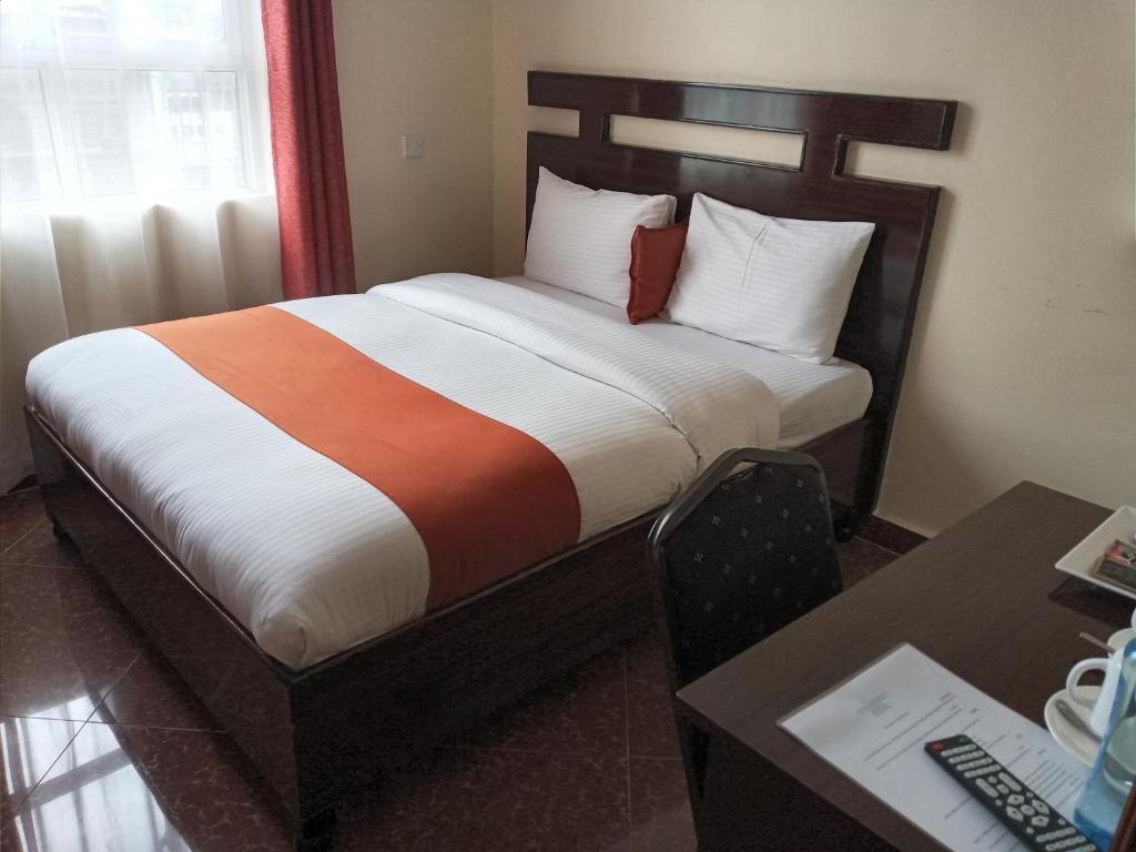 Postel nebo postele na pokoji v ubytování Claire de Lune Moonlight Hotel