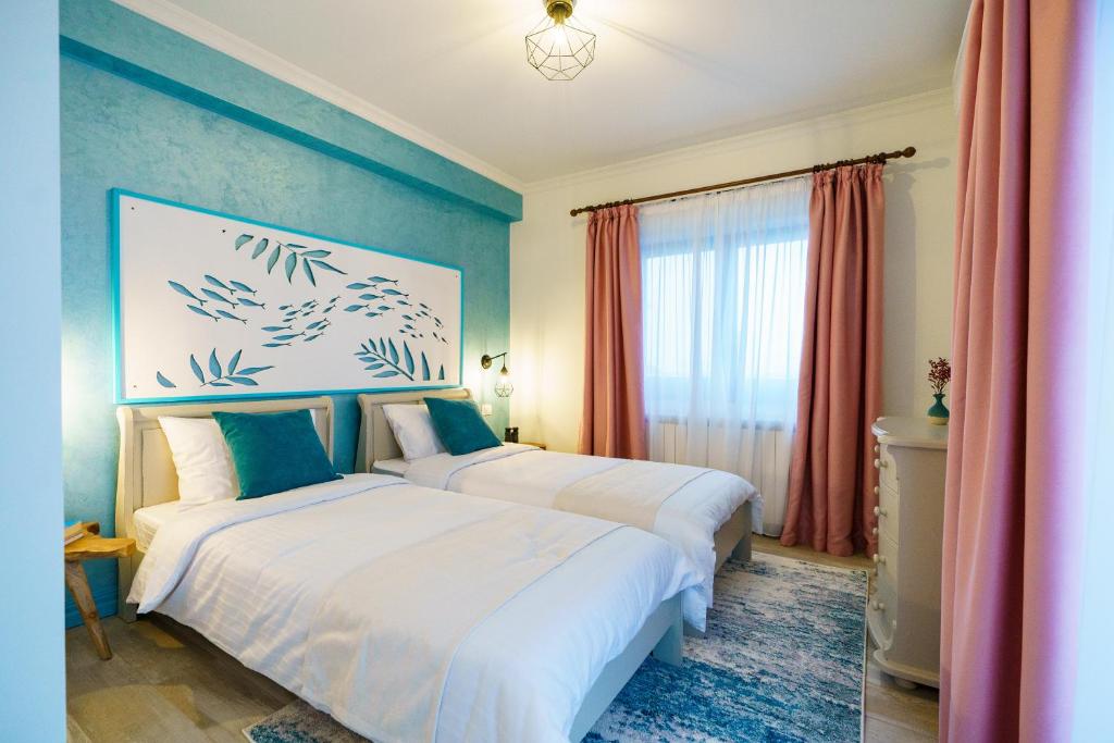 Letto o letti in una camera di Pensiunea Cuplu Călător