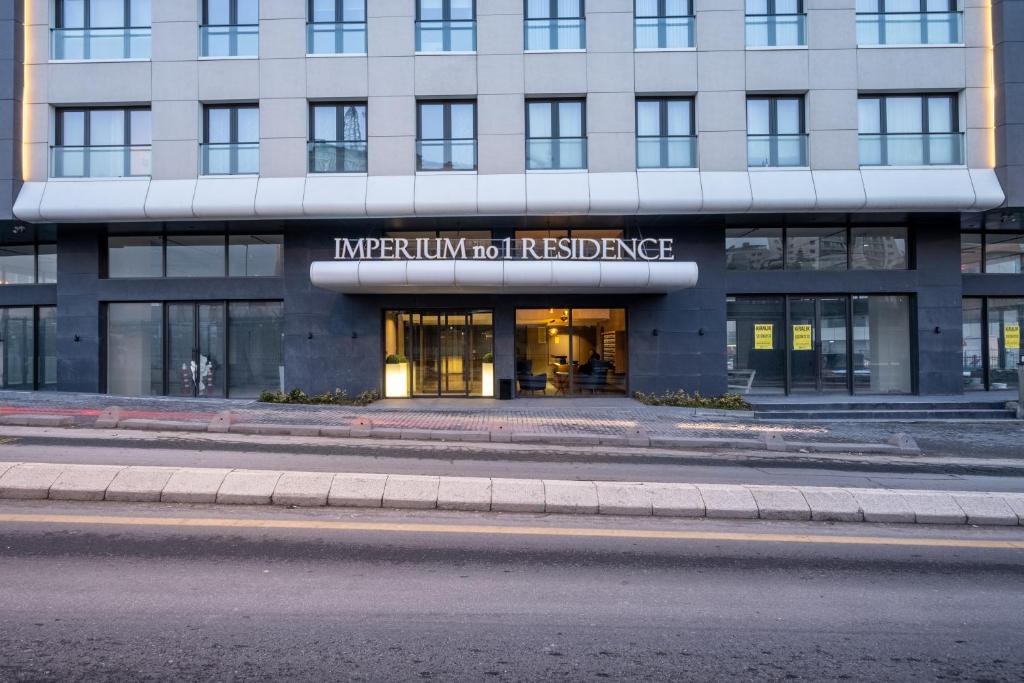 a building with a sign that reads imperialism not residence at Imperium No.1 Residence by NewInn in Istanbul