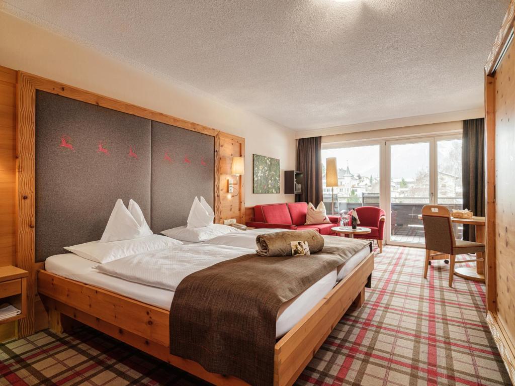 Postel nebo postele na pokoji v ubytování Rieser Achensee Resort