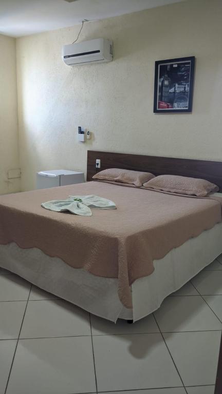 Postel nebo postele na pokoji v ubytování Hotel Imperial
