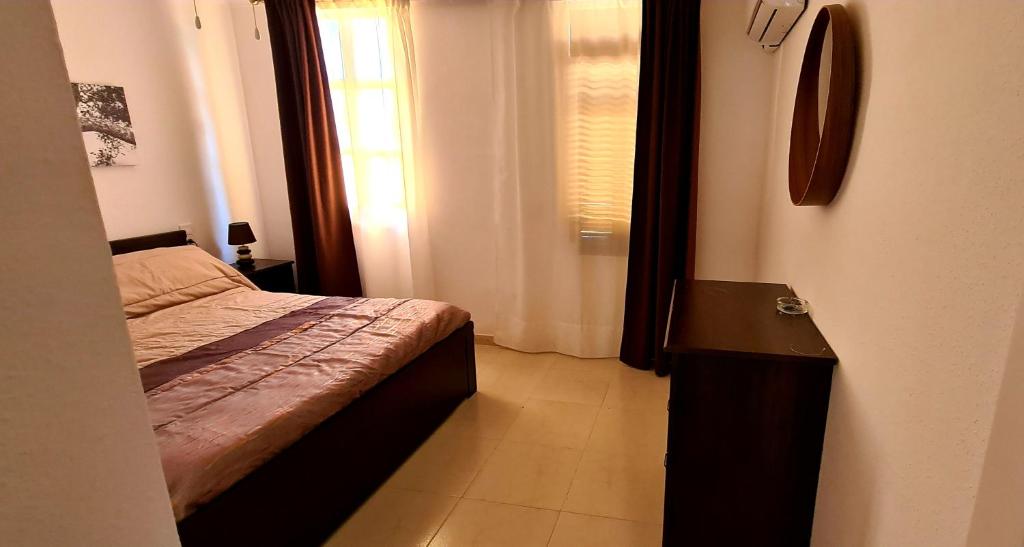 A bed or beds in a room at Dolce Vita
