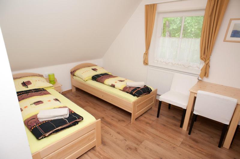 Postel nebo postele na pokoji v ubytování Penzion Prátr