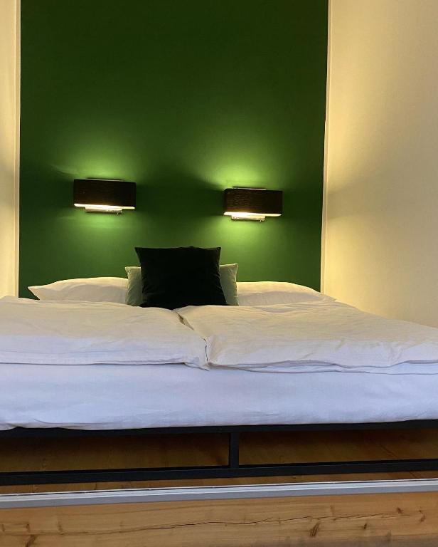 Postel nebo postele na pokoji v ubytování Jasper's Boutique Hotel
