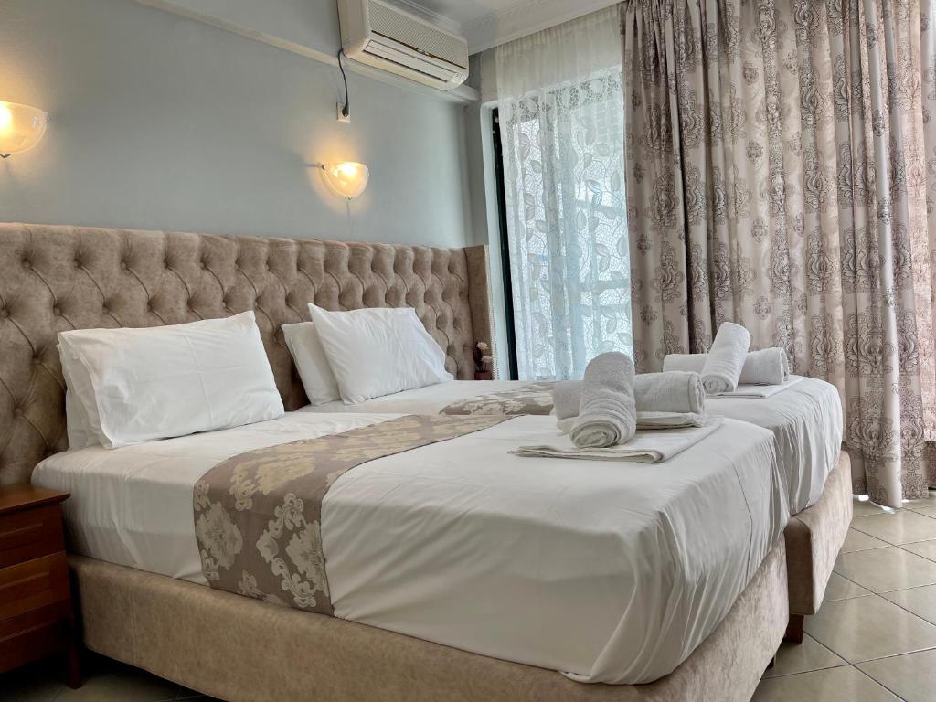 Posteľ alebo postele v izbe v ubytovaní Ethereal Villas Lefkas