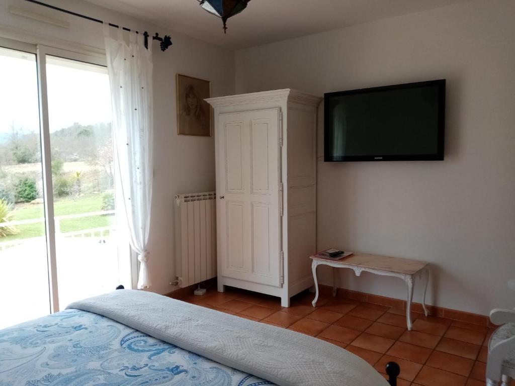 Postel nebo postele na pokoji v ubytování chambres d'hôtes du capimont