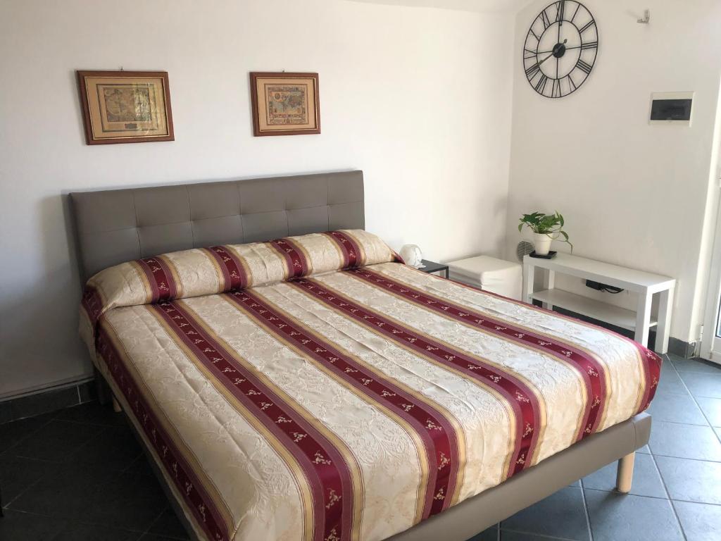 Letto o letti in una camera di Casa Portofino