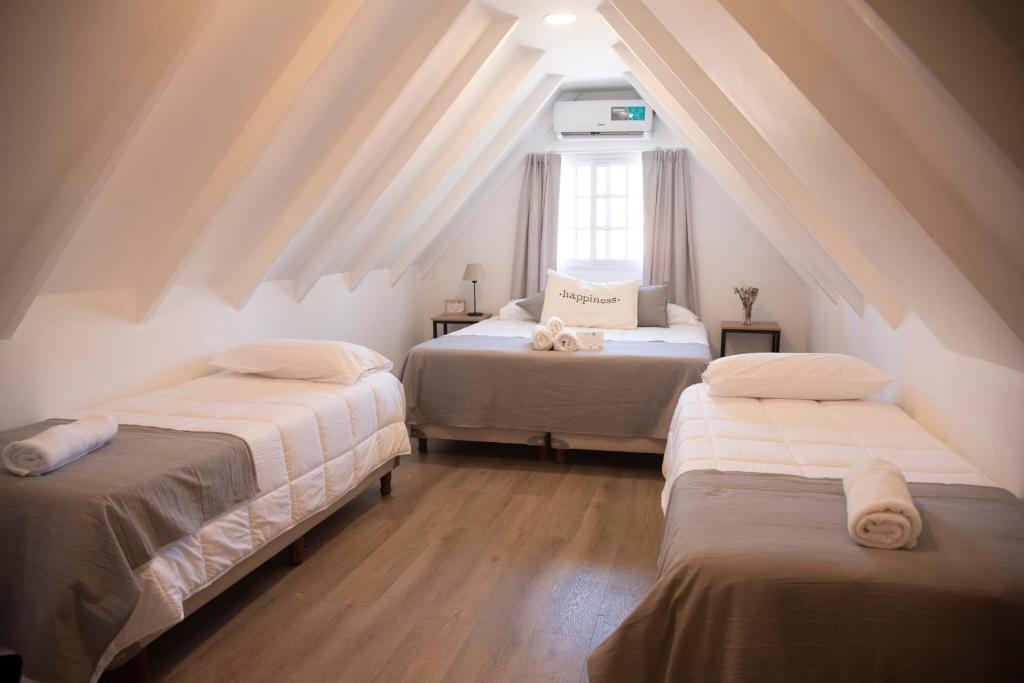 מיטה או מיטות בחדר ב-RIO TIGRE HOTEL
