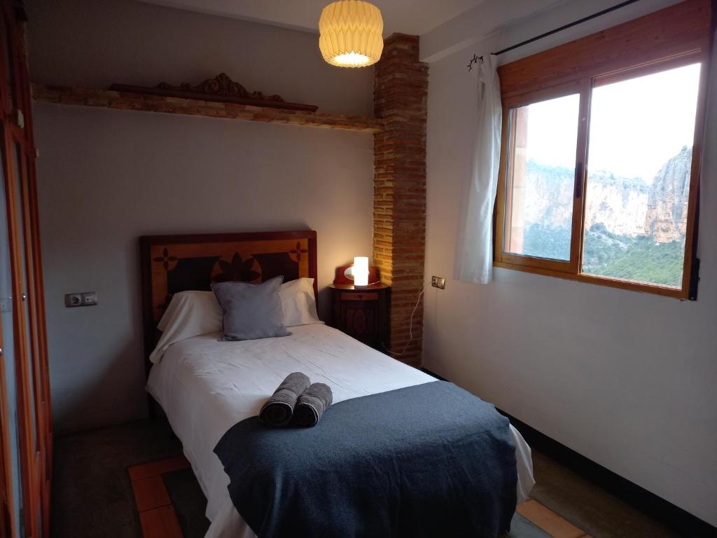 Cama o camas de una habitación en Casa Rural La Rocha