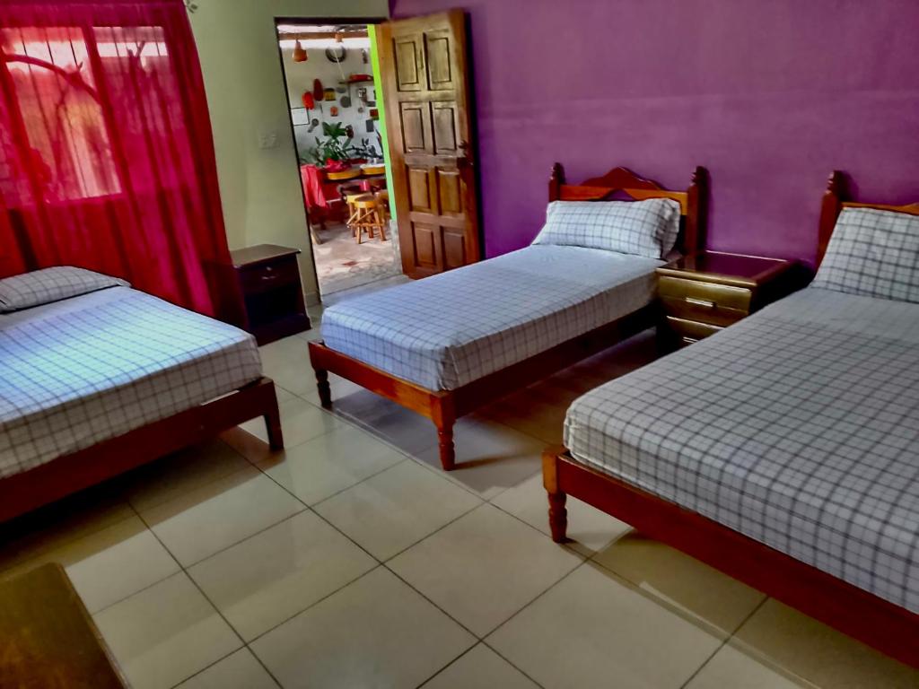 En eller flere senge i et værelse på Casa “Doña Zoyla” B&B