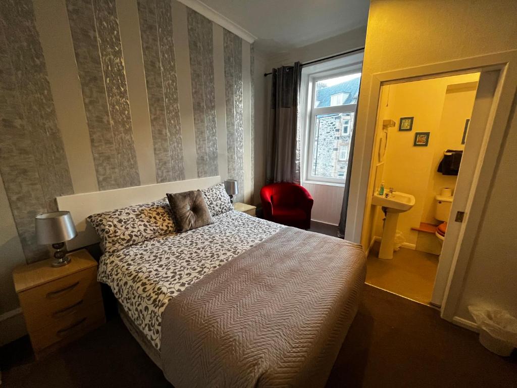 Postel nebo postele na pokoji v ubytování Dunarle Guesthouse