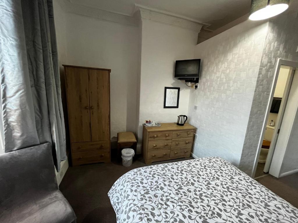 Postel nebo postele na pokoji v ubytování Dunarle Guesthouse