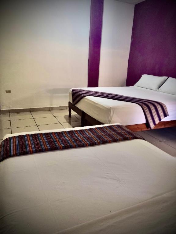 Postel nebo postele na pokoji v ubytování Casa “Doña Zoyla” B&B