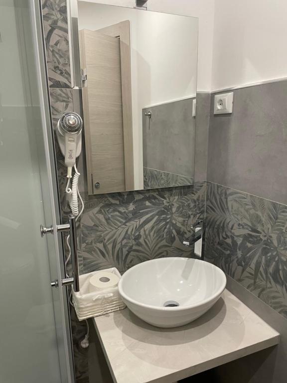 Koupelna v ubytování Domus La Foce Hotel