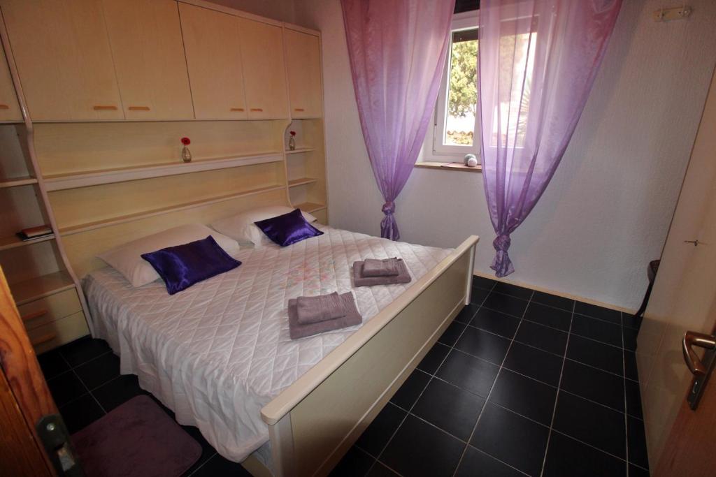Postel nebo postele na pokoji v ubytování Apartment Zepina
