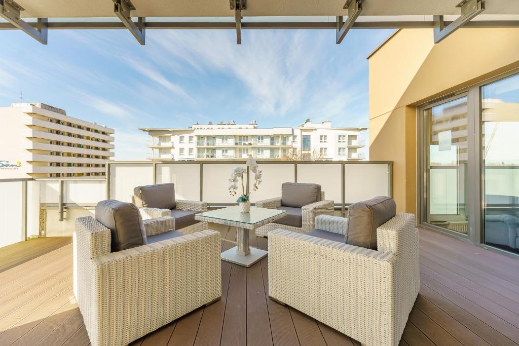 Posedenie v ubytovaní 3L Apartments Kasprowicza VIP