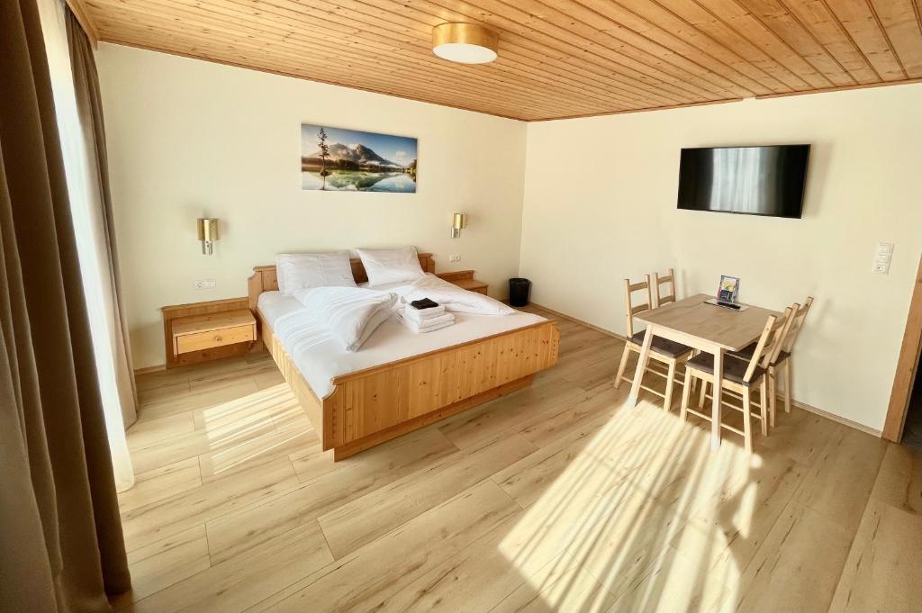Postel nebo postele na pokoji v ubytování Haus Seerose