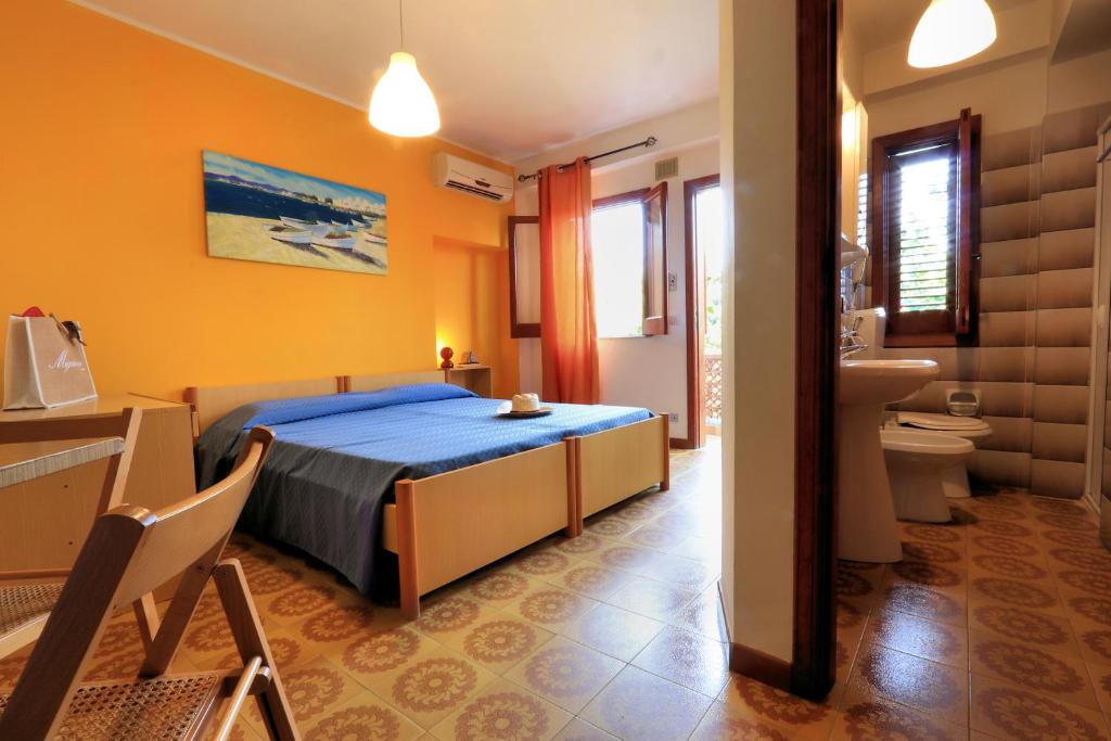 Posteľ alebo postele v izbe v ubytovaní Testa di Monaco - Basic Beach Accommodations