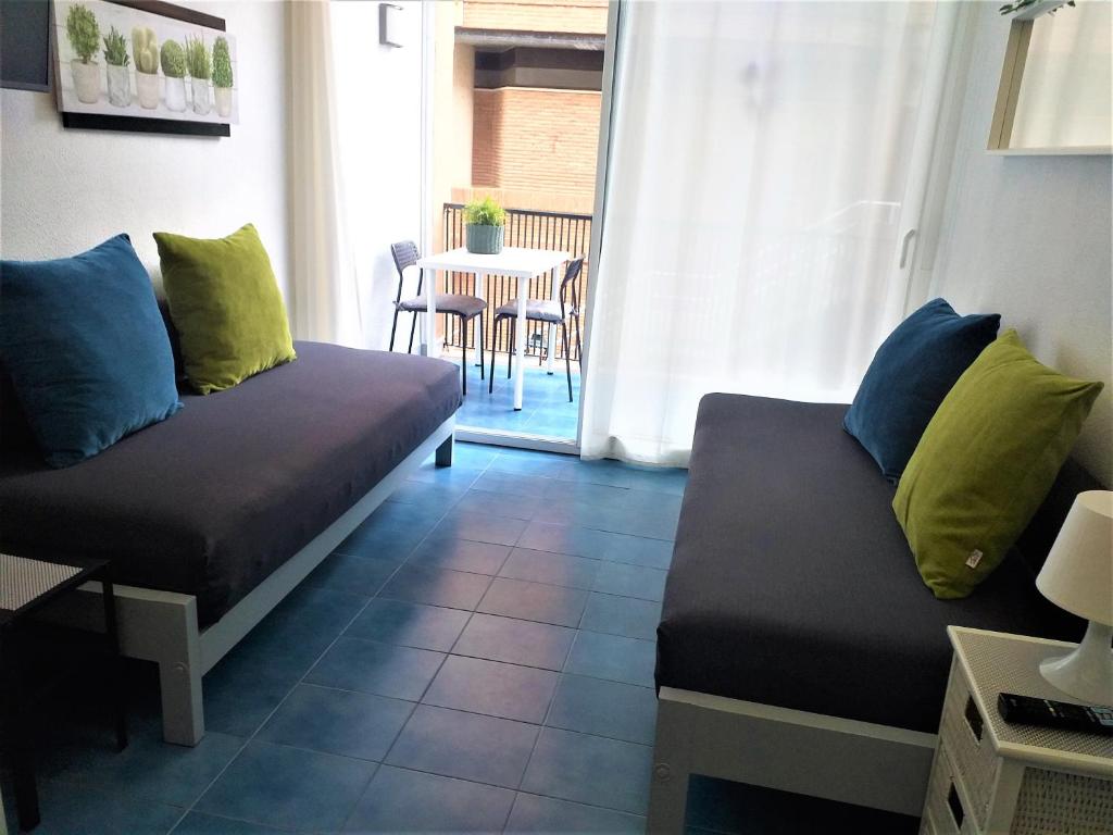 Posezení v ubytování APARTAMENTO con TERRAZA VISTAS AL MAR