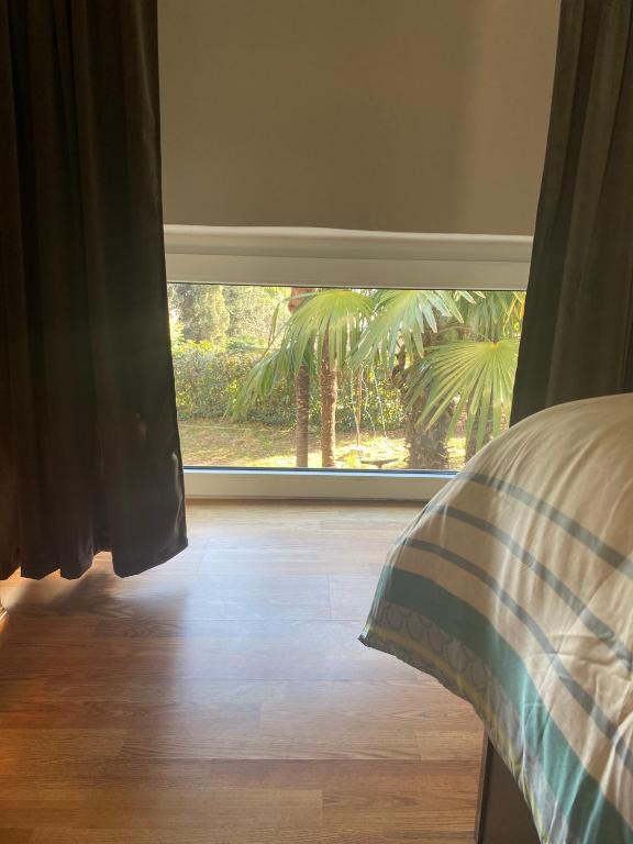 Posteľ alebo postele v izbe v ubytovaní Apartman Tia