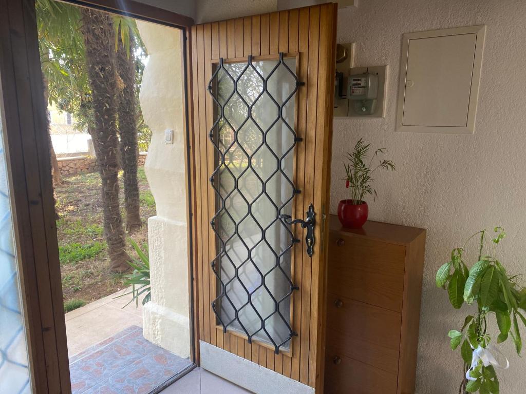 Vonkajšia záhrada v ubytovaní Apartman Tia