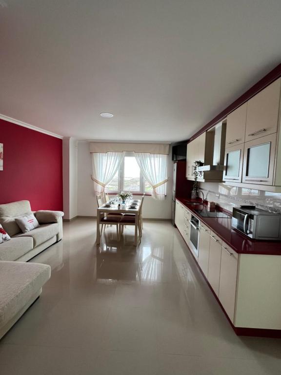 Kuchyň nebo kuchyňský kout v ubytování Apartamentos María de Lucía - Piso B