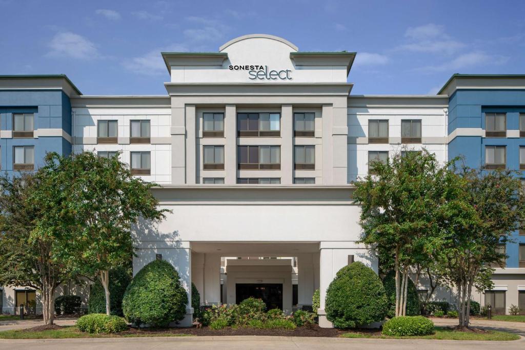 a rendering of the front of the sheraton austin hotel at Sonesta Select Nashville Airport Suites in Nashville