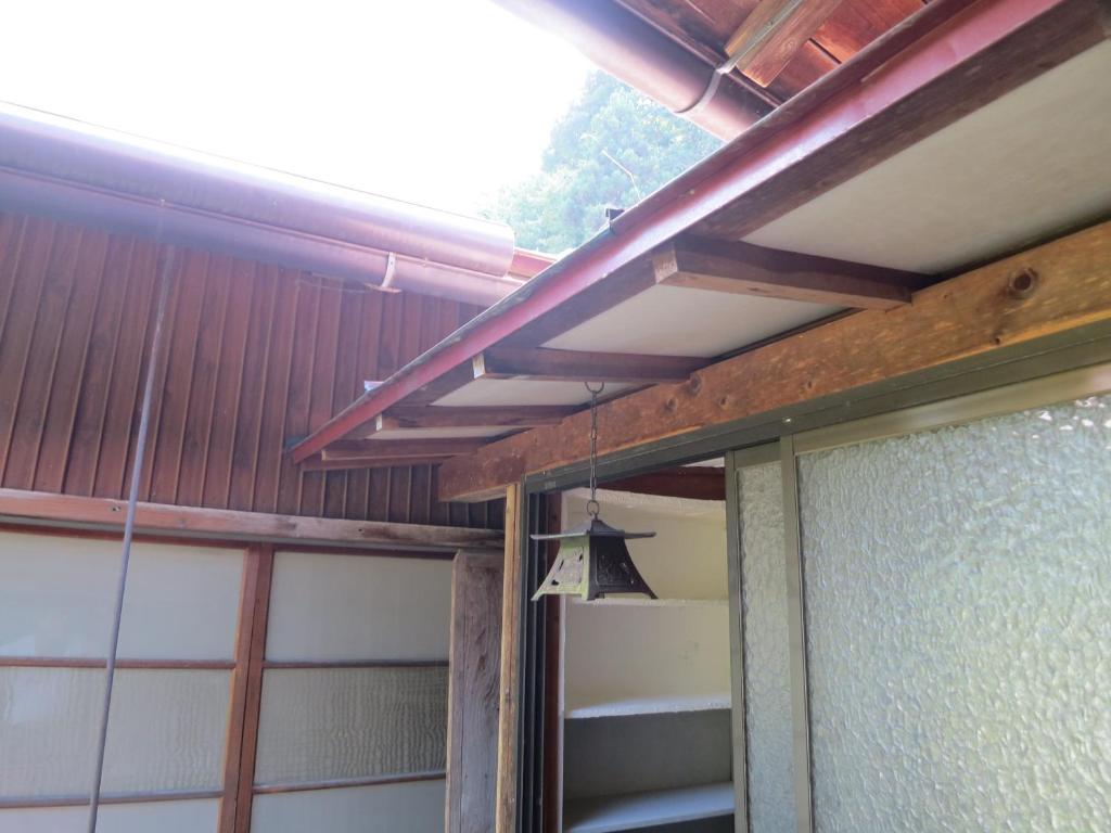 Palanda nebo palandy na pokoji v ubytování Guesthouse Nishiki