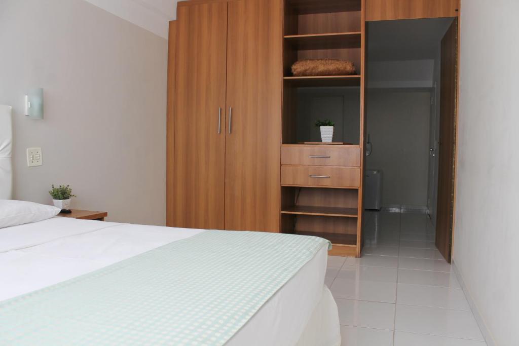 Postel nebo postele na pokoji v ubytování Hotel Doral Apucarana