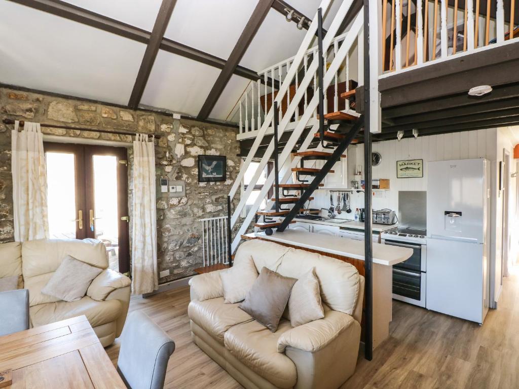Kuchyň nebo kuchyňský kout v ubytování Corner Cottage