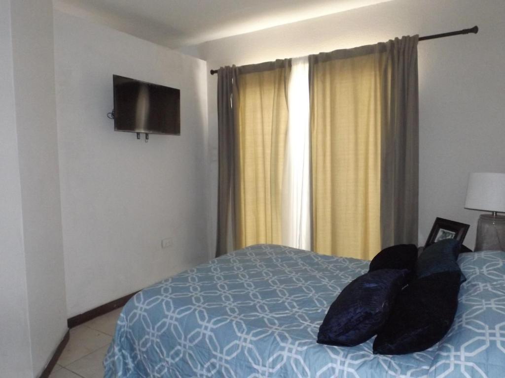 Postel nebo postele na pokoji v ubytování Departamento UNIVERSITARIO en fraccionamiento privado