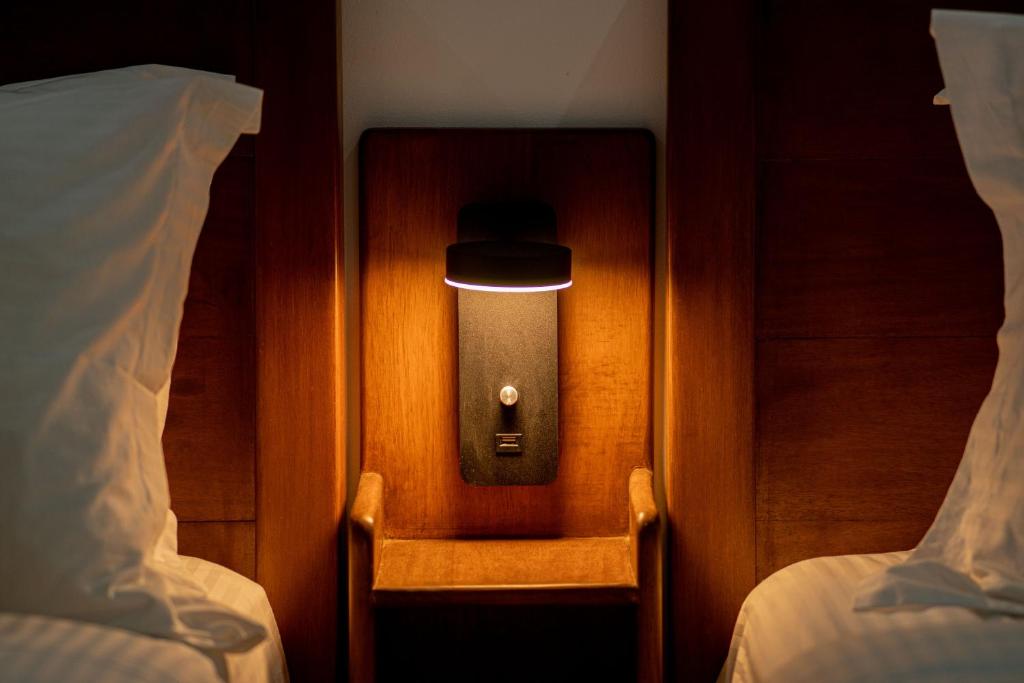 Postel nebo postele na pokoji v ubytování Thistle Inn