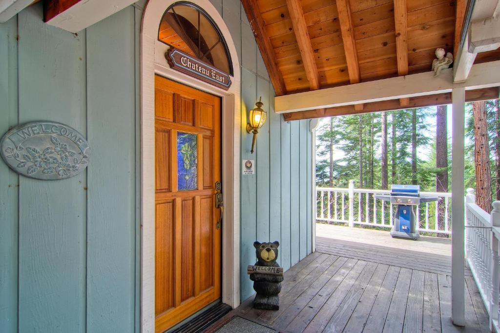 a front door of a house with a porch at Chateau Royal East in Yosemite West