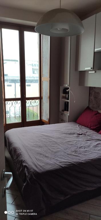 Postel nebo postele na pokoji v ubytování Lovely home: Turin