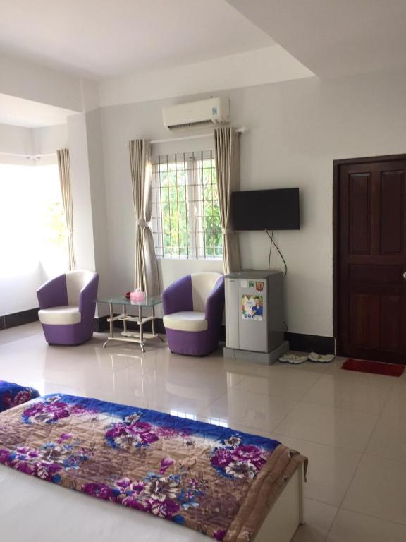 Nhà Nghỉ Thiên Minh - Habitación Cuádruple Con Balcón