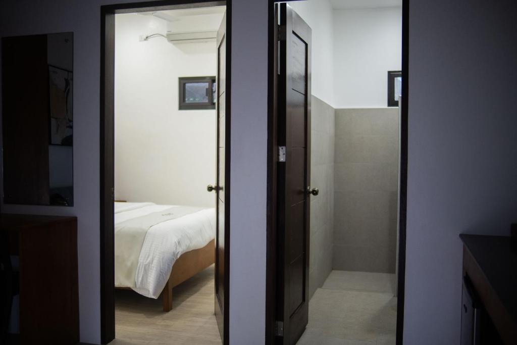 Postel nebo postele na pokoji v ubytování Thistle Inn