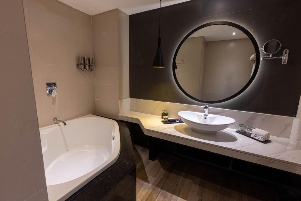 Koupelna v ubytování Coro Hotel