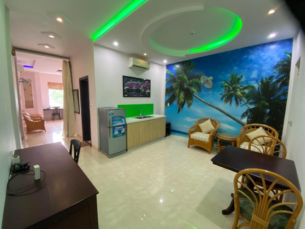 TV a/nebo společenská místnost v ubytování Areca Riverside Đà Nẵng