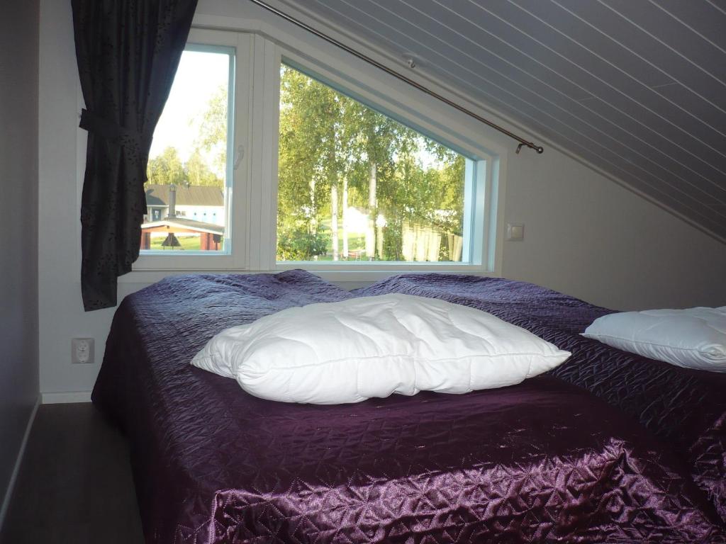 Postel nebo postele na pokoji v ubytování Camping Tornio