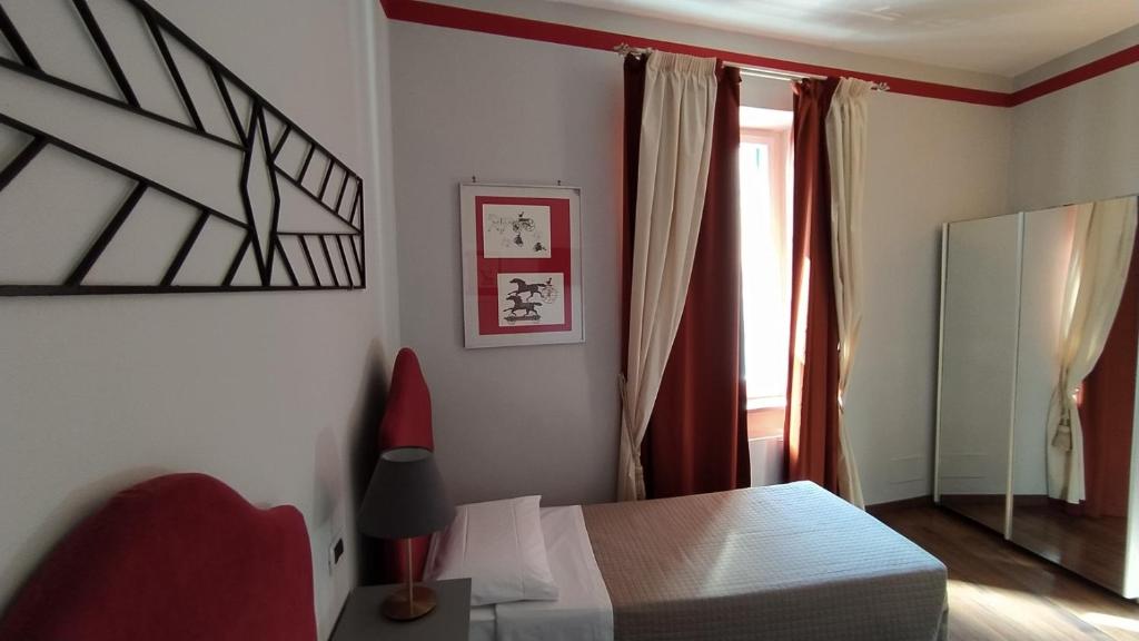 Postel nebo postele na pokoji v ubytování Albergo Moderno