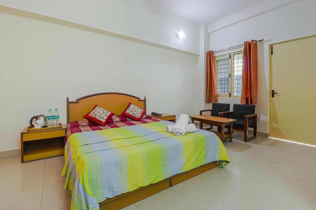 Säng eller sängar i ett rum på Hotel Siddharth