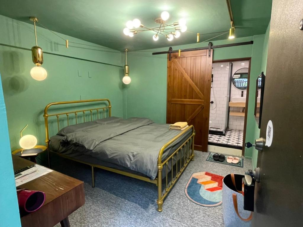 Postel nebo postele na pokoji v ubytování Hinoki Mansion