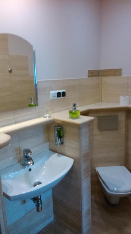 Kúpeľňa v ubytovaní Centrum Konferencyjne IBIB PAN