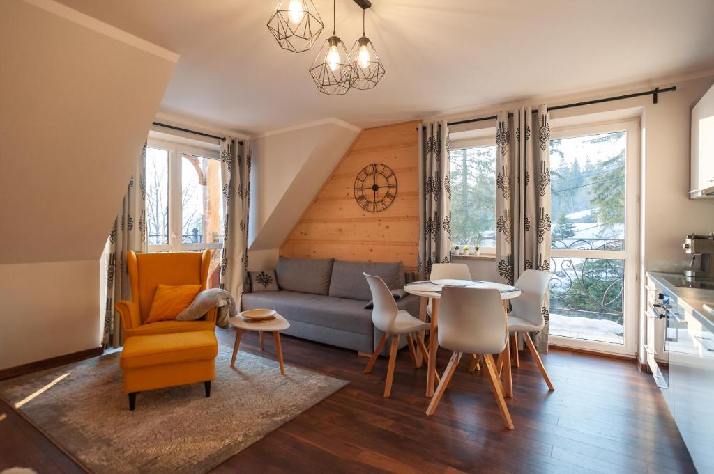 Posedenie v ubytovaní Apartamenty na wzgórzu APARTZAKOP