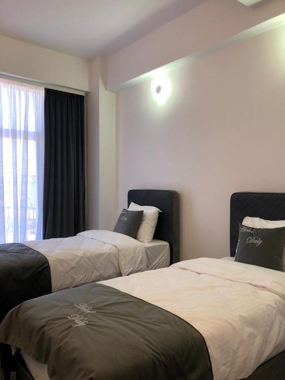 Postel nebo postele na pokoji v ubytování Hotel Daly